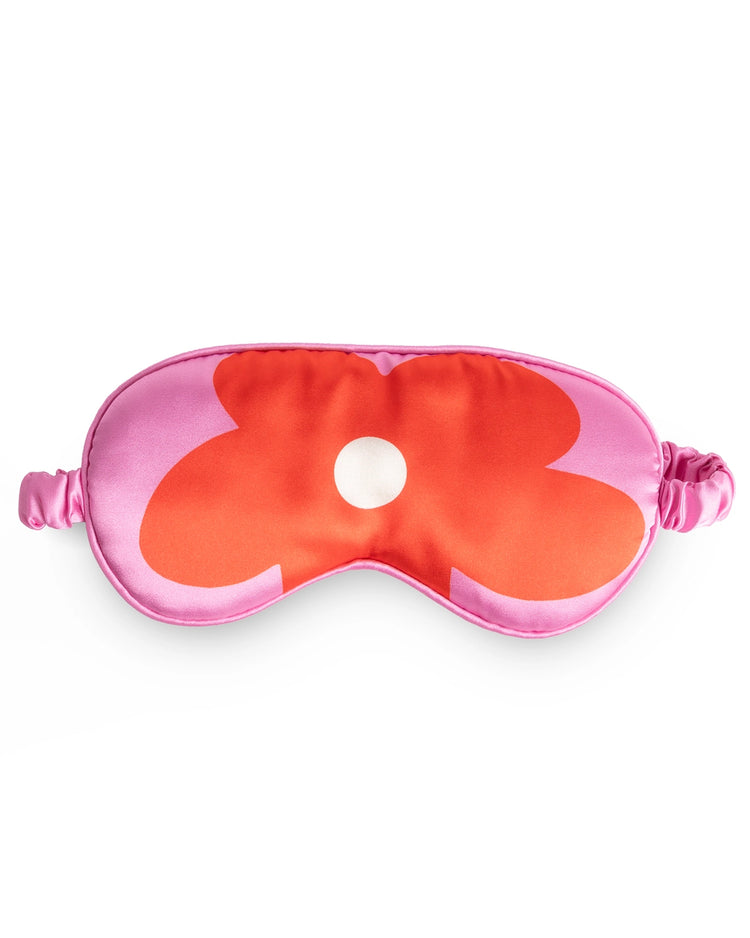 Masque de sommeil avec motif floral rose sur fond doux