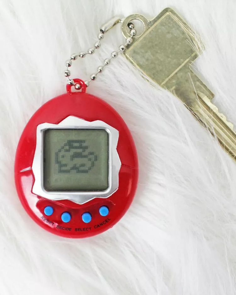 Animal de compagnie virtuel avec un design coloré et mignon.