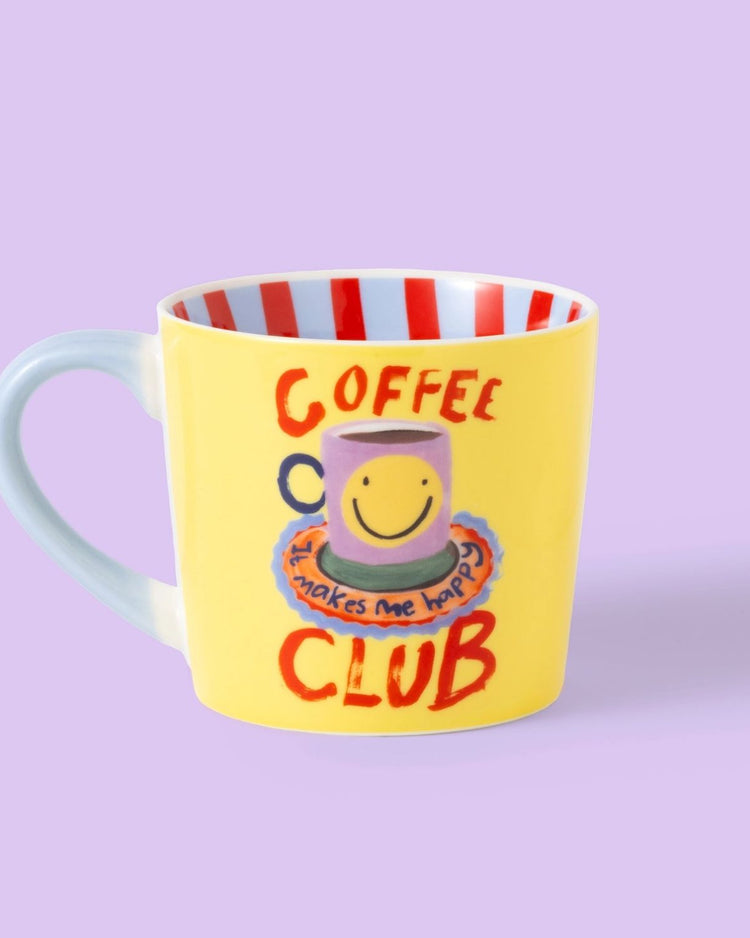 Mug Coffee Club avec message coloré et design moderne.