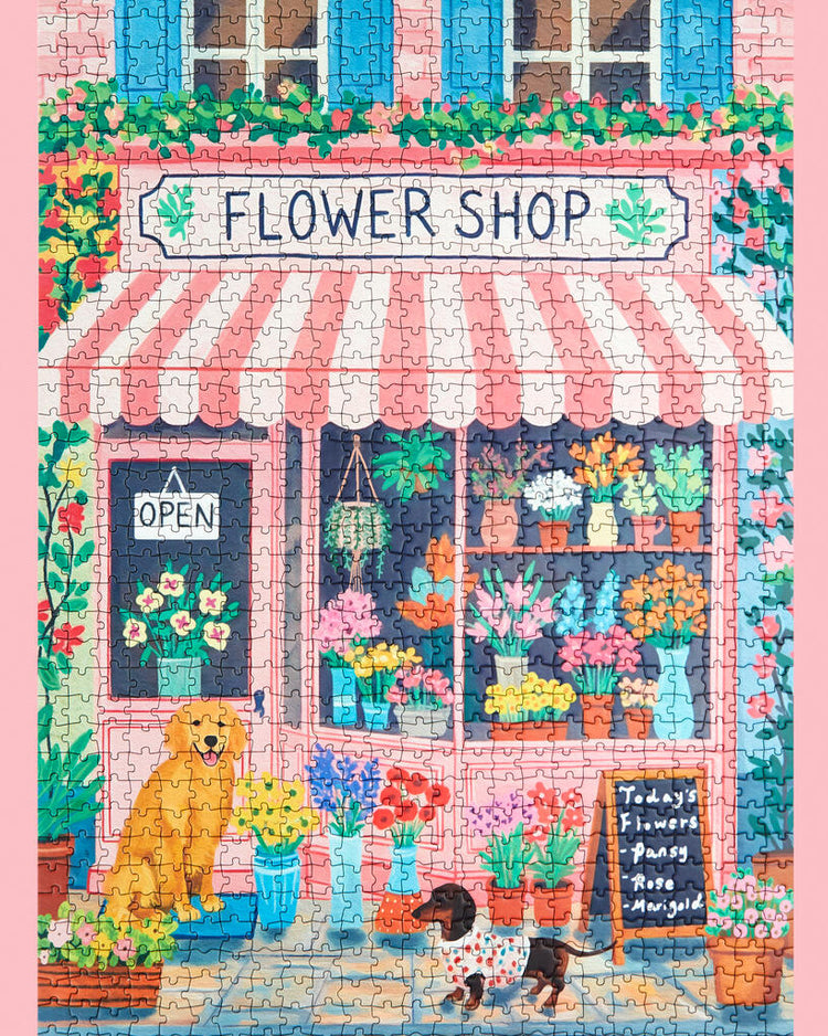 Puzzle représentant un fleuriste avec volets bleus et auvent rayé.