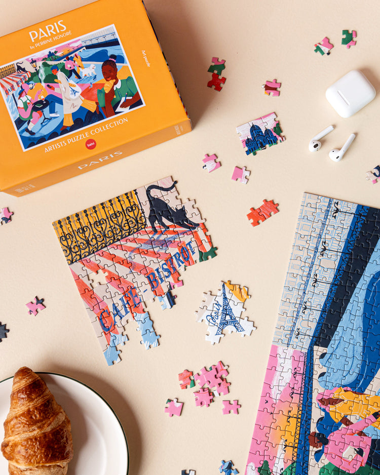 Puzzle représentant la Tour Eiffel avec des détails colorés