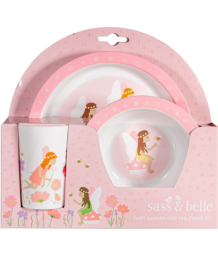 Assiette plate avec fées en mission florale, design ludique.