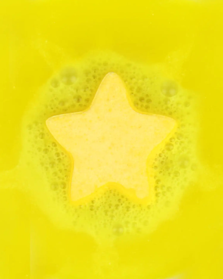 Bombe de bain dorée 'You're a star' avec éclats brillants