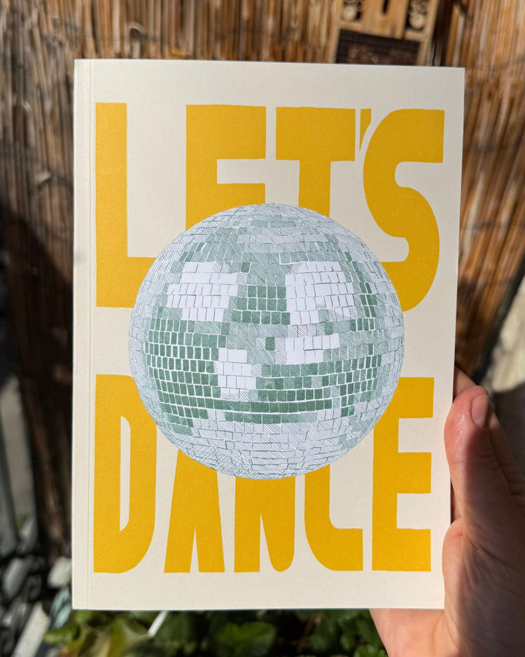 Carnet Let's Dance avec motif de boule à facettes scintillante.