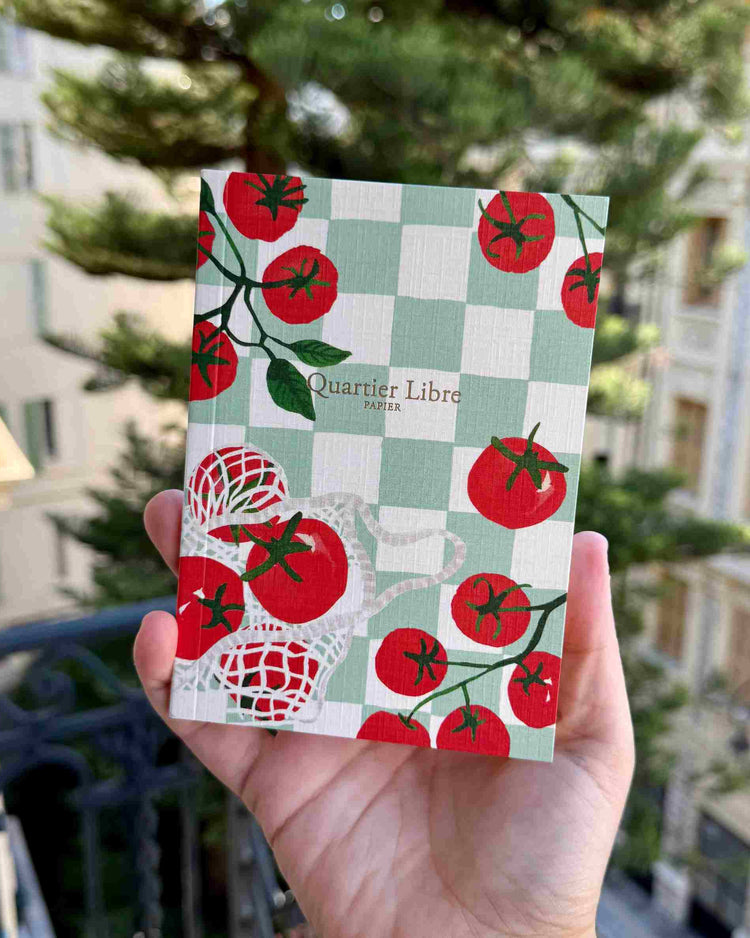 Carnet Tomates avec couverture en toile texturée et pages lignées.