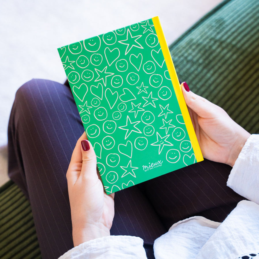 Carnet coloré avec message positif sur la couverture