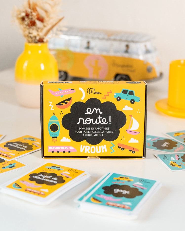 Boîte du jeu 'En route!' avec illustrations colorées.