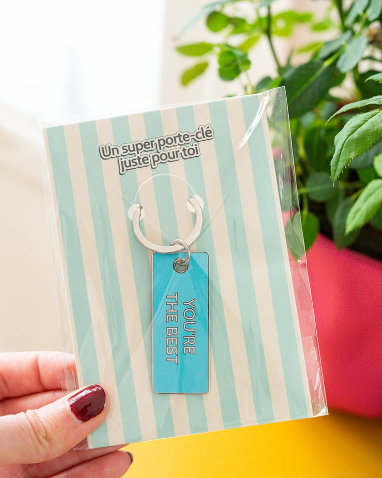 Porte-clé 'You're the Best' avec design coloré et texte en relief.