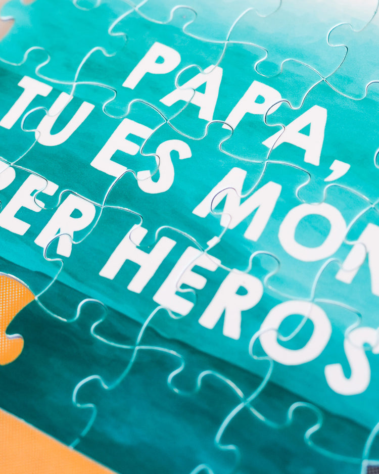 Puzzle coloré avec le message pour papa en gros caractères.