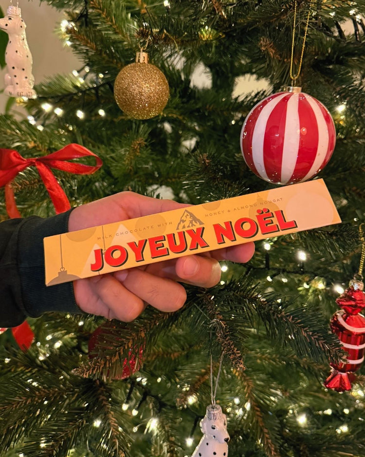 Toblerone Joyeux Noël avec emballage festif et motifs de Noël