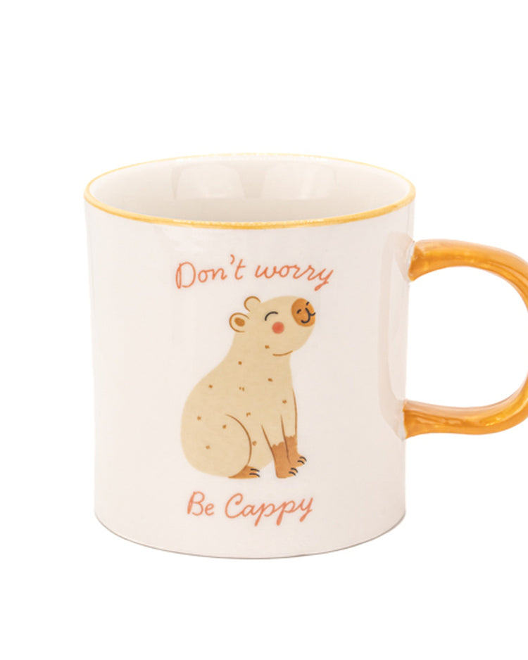 Mug avec capybara espiègle et message positif en gros plan