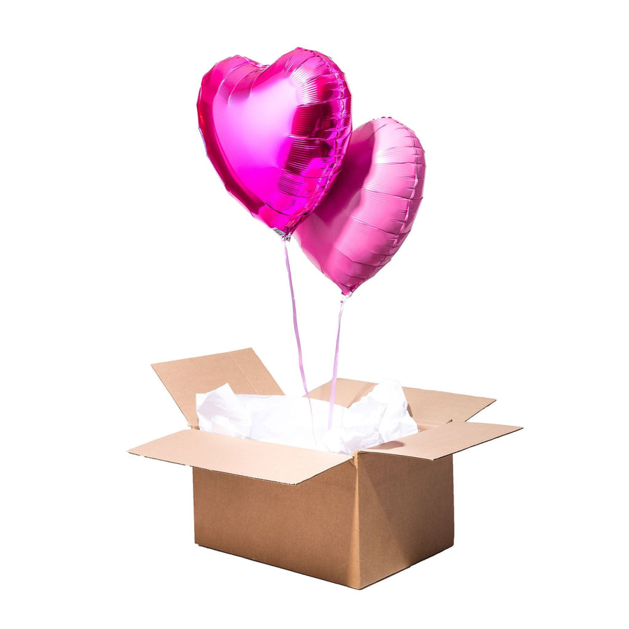 Pack de 2 ballons en forme de cœur pour une décoration romantique.