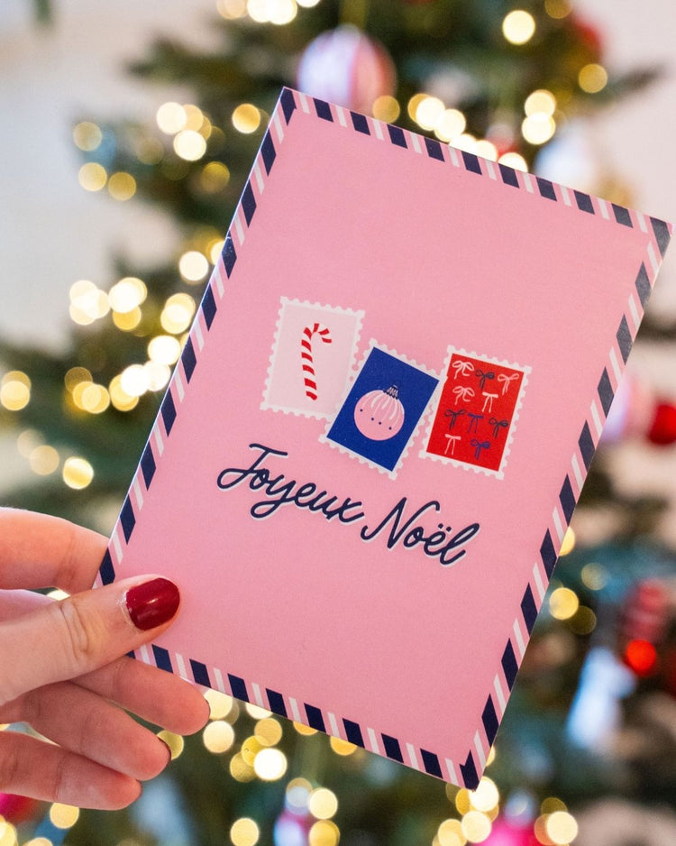 Carte postale Joyeux Noël avec timbres illustrés colorés