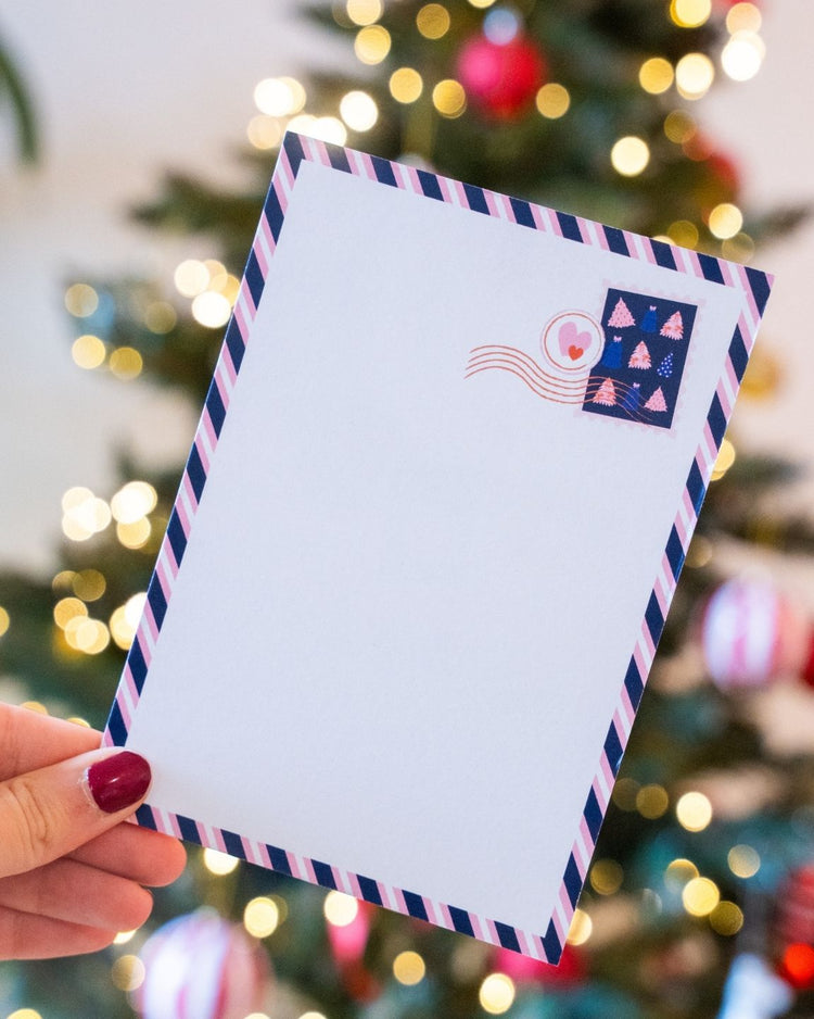 Carte postale Joyeux Noël avec timbres illustrés colorés