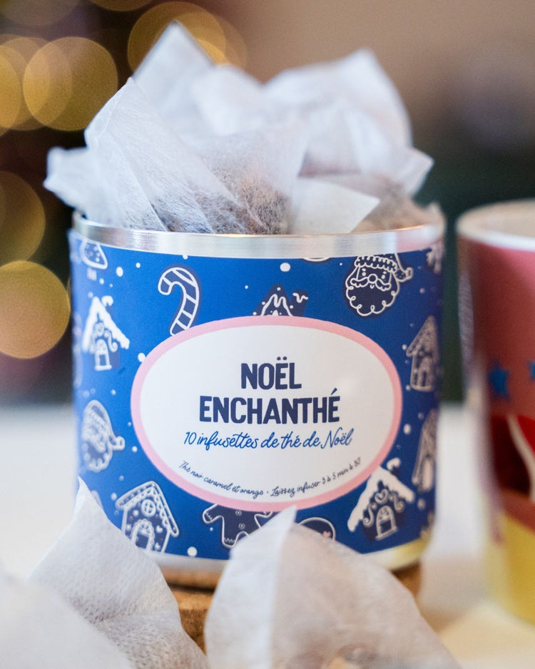 Boîte de thé Noël Enchanthé avec motifs festifs et dorés