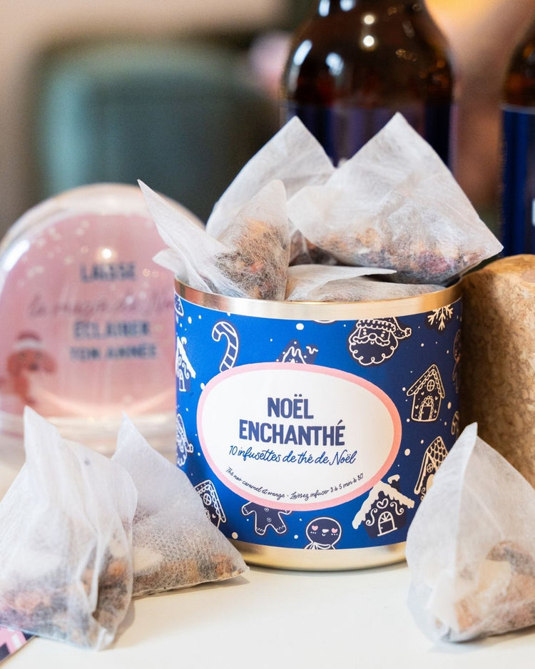 Boîte de thé Noël Enchanthé avec motifs festifs et dorés