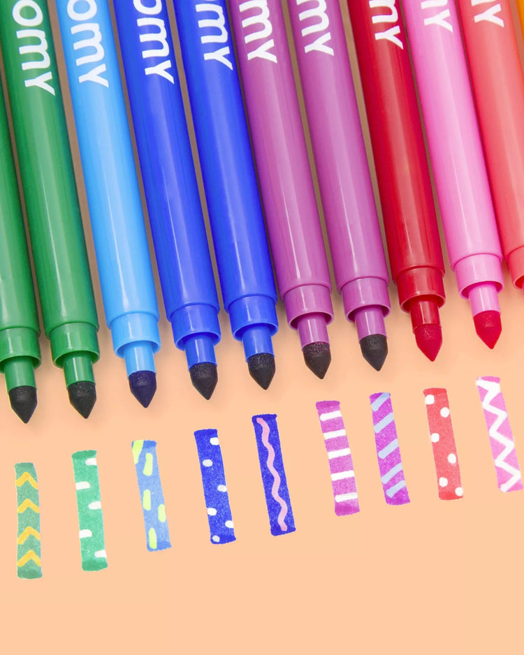 Lot de 16 feutres OMY avec capuchons colorés et motifs variés