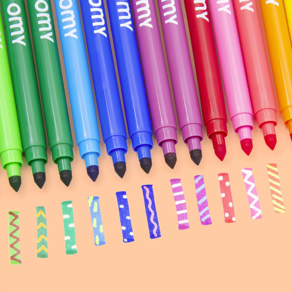 Lot de 16 feutres OMY avec capuchons colorés et motifs variés