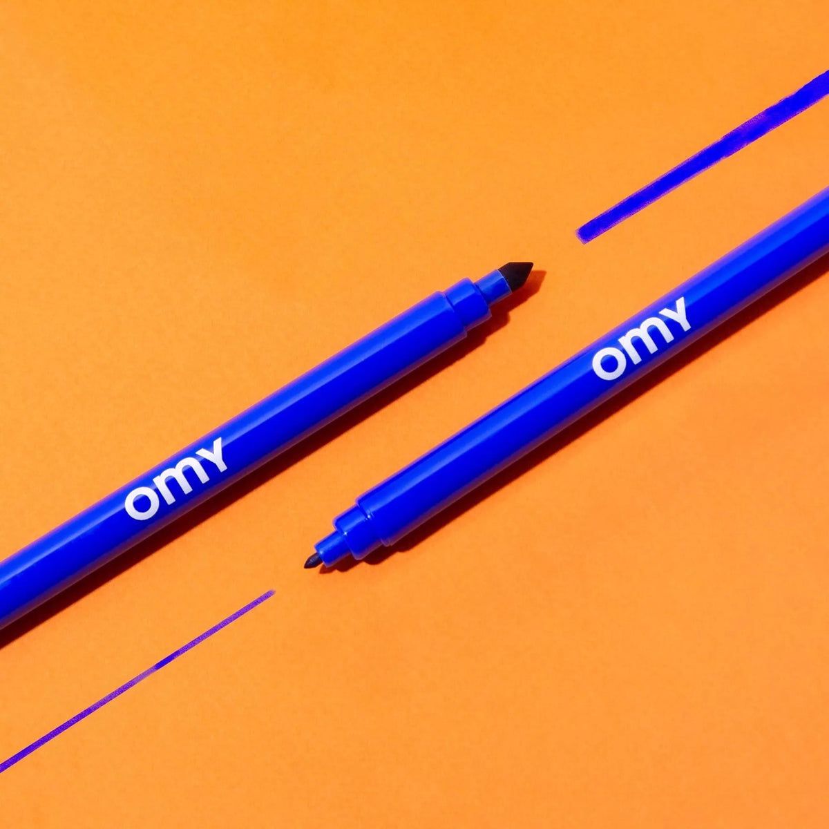 Lot de 16 feutres OMY avec capuchons colorés et motifs variés