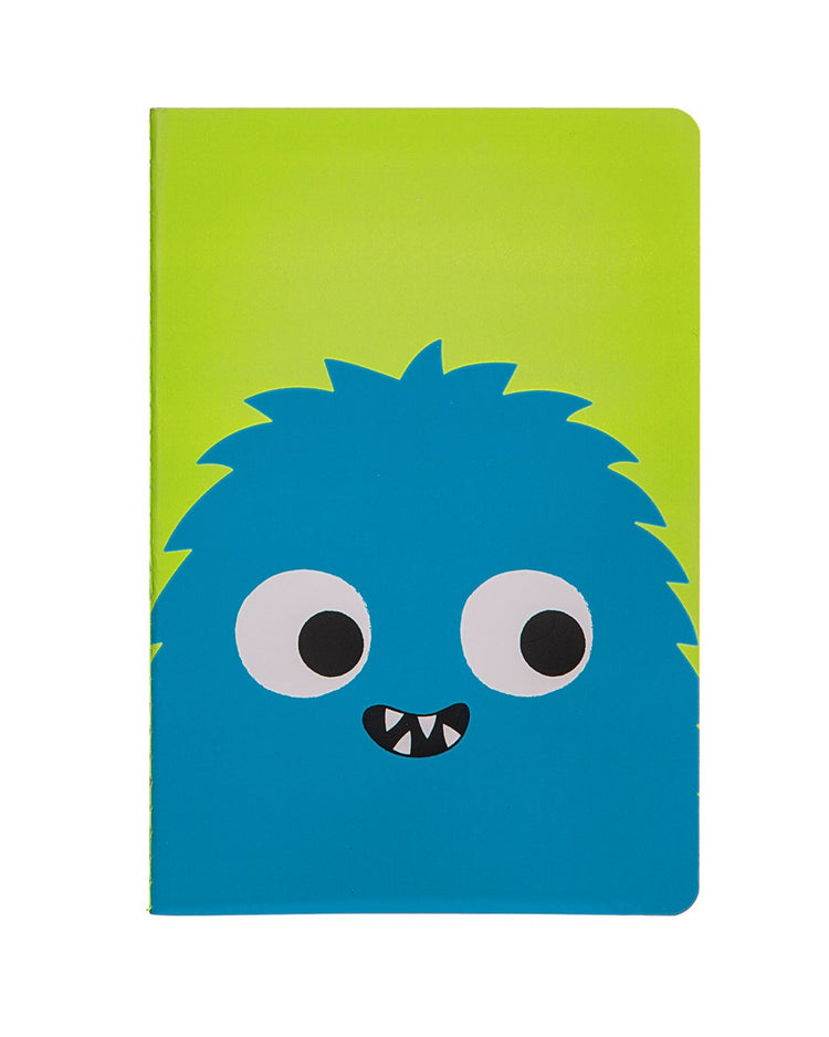 Carnet avec grands yeux et dents pointues, design ludique.