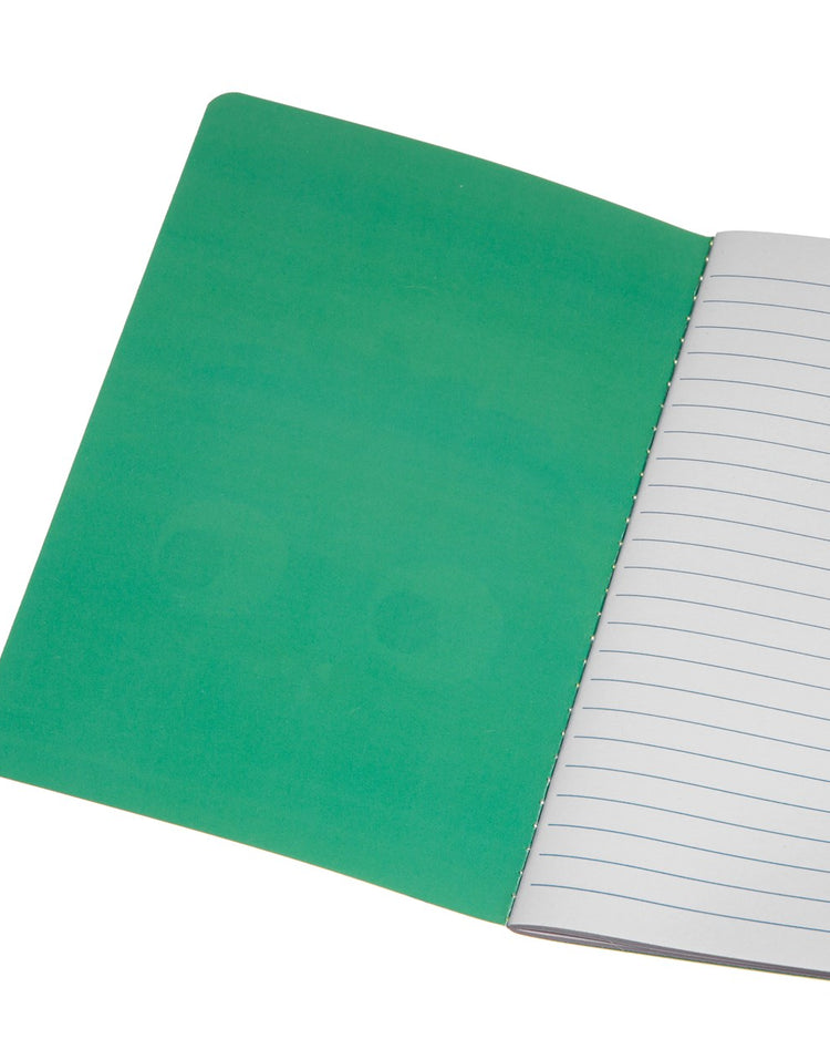 Carnet avec un monstre aux grands yeux et dents pointues