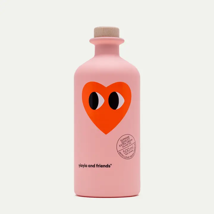 Bouteille d'huile d'olive avec étiquette colorée et design élégant.