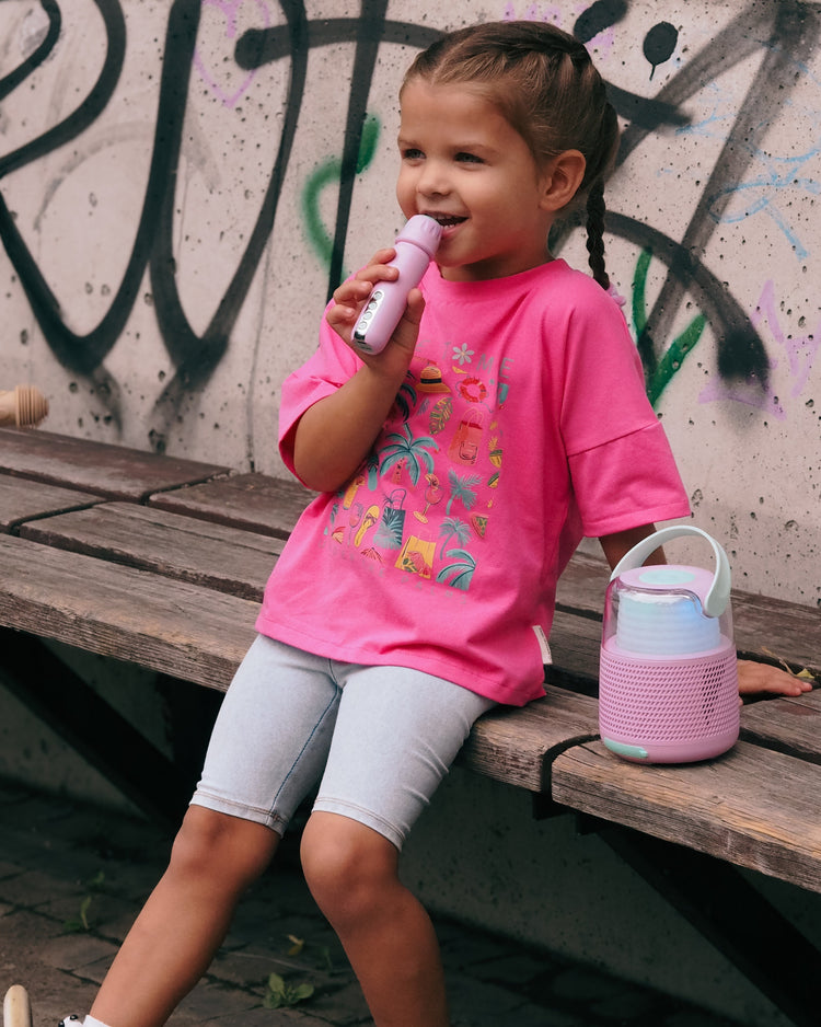 Enceinte Bluetooth rose avec lumières et micro sans fil