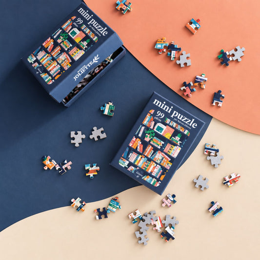 Mini puzzle représentant des livres colorés, idéal pour les passionnés