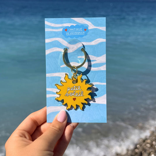 Porte-clés en forme de soleil avec message 'Petit Soleil