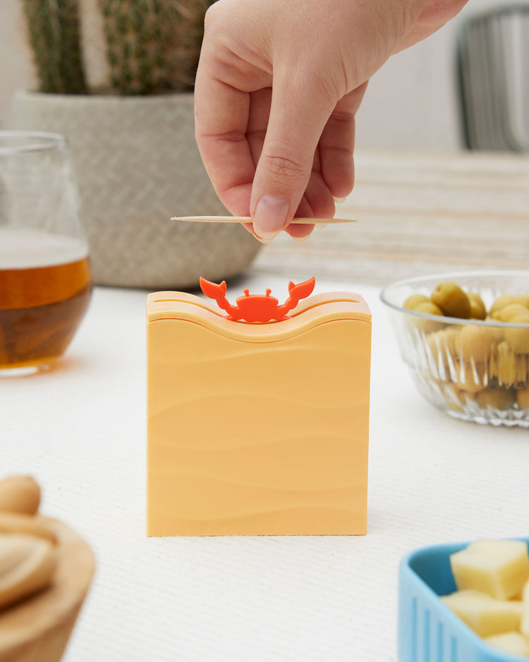 Porte cure-dents en forme de crabe avec pinces ouvertes