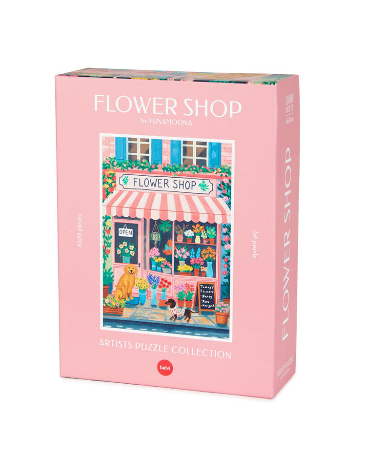 Puzzle représentant une boutique de fleurs avec volets bleus.