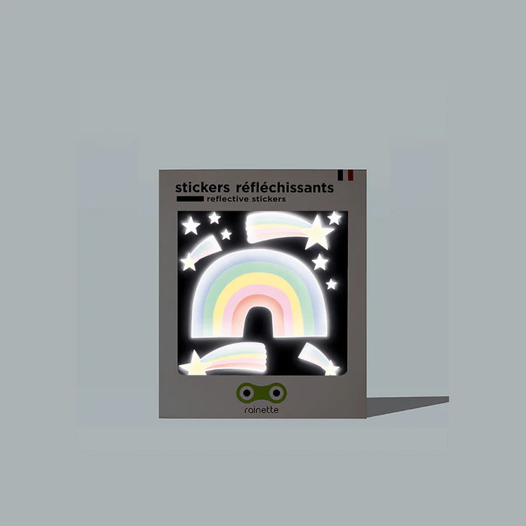 Stickers réfléchissants enfant en forme d'arc-en-ciel sur fond clair.