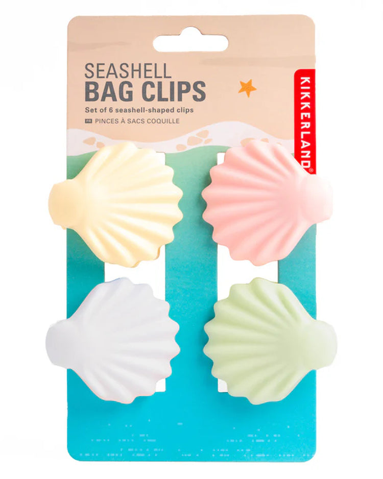 Pinces à sachets en forme de coquillage sur fond blanc