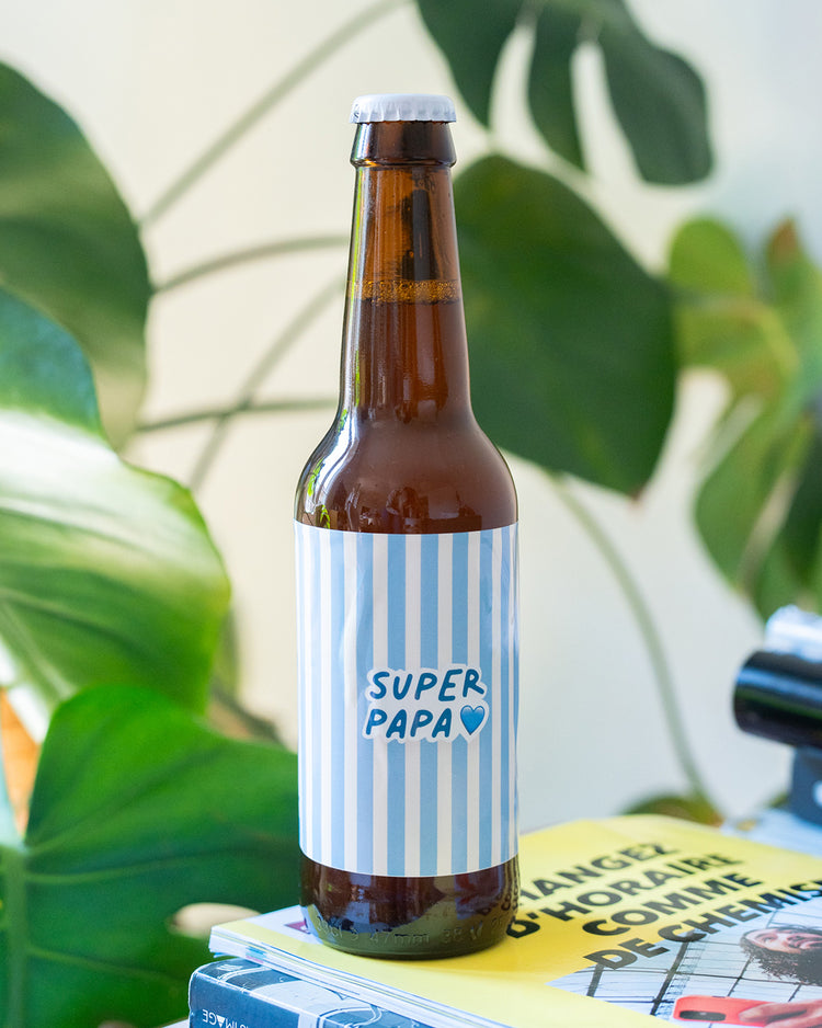 Bière Super Papa avec étiquette colorée et design festif
