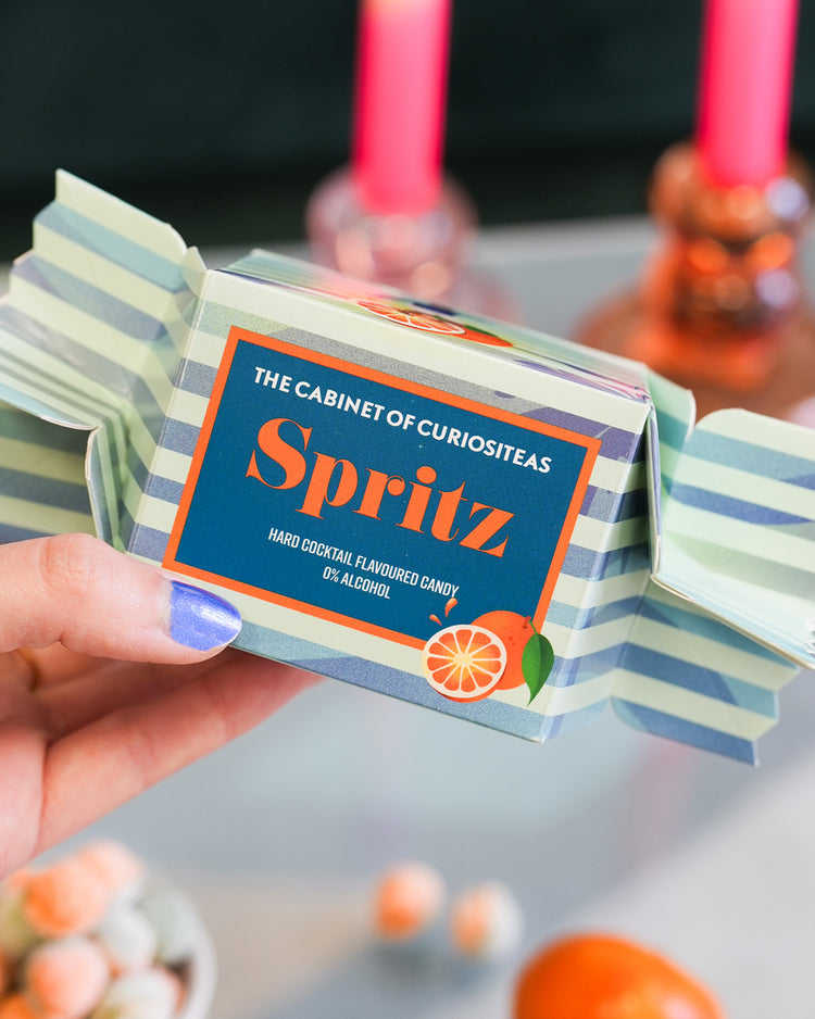 Bonbons Orange Spritz en gros plan, texture brillante et colorée.