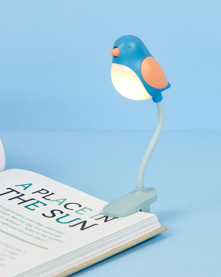 Liseuse Birdie bleue en forme d'oiseau avec bras flexible