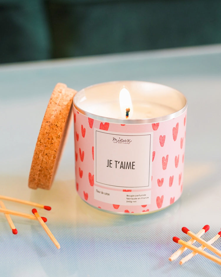 Bougie à message avec motif floral sur le verre
