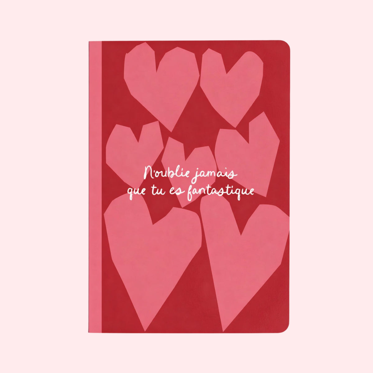 Carnet coloré avec des cœurs, message inspirant en couverture