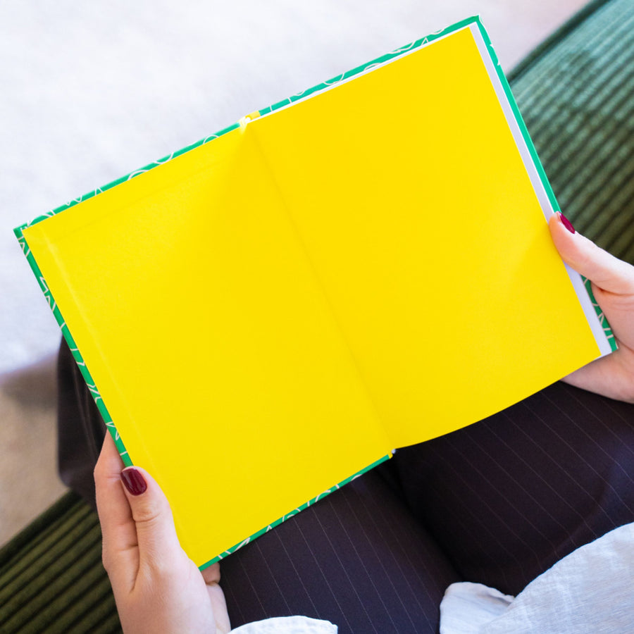 Carnet coloré avec message positif sur la couverture