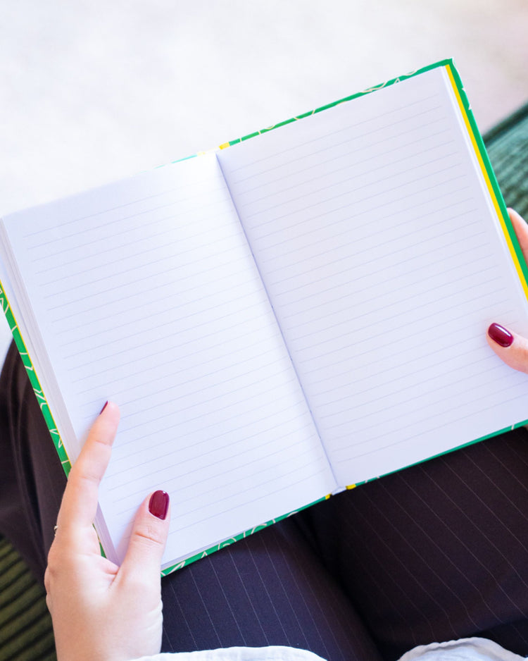 Carnet coloré avec message positif sur la couverture