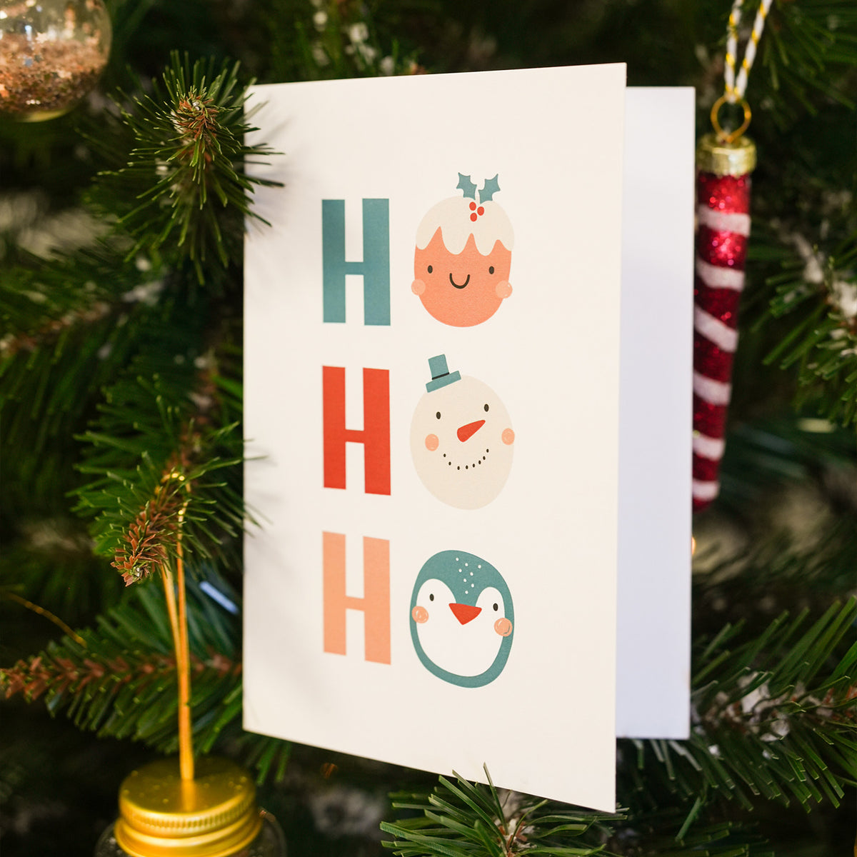 Carte de Noël avec motif givré et texte 'Ho Ho Ho'