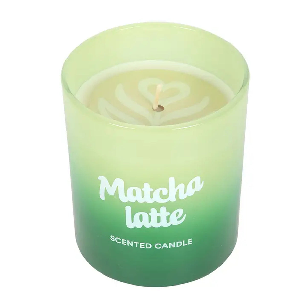 Bougie Matcha dans un pot en verre élégant sur fond neutre