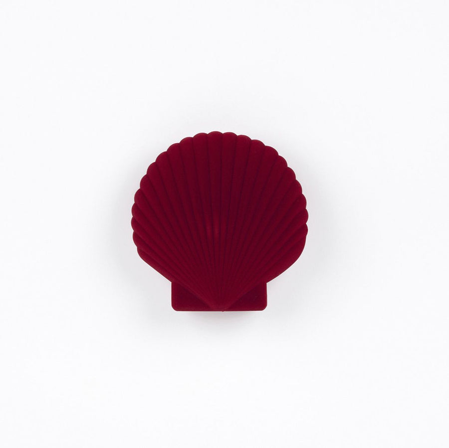 Boîte à bijoux en forme de coquillage rouge, vue de dessus
