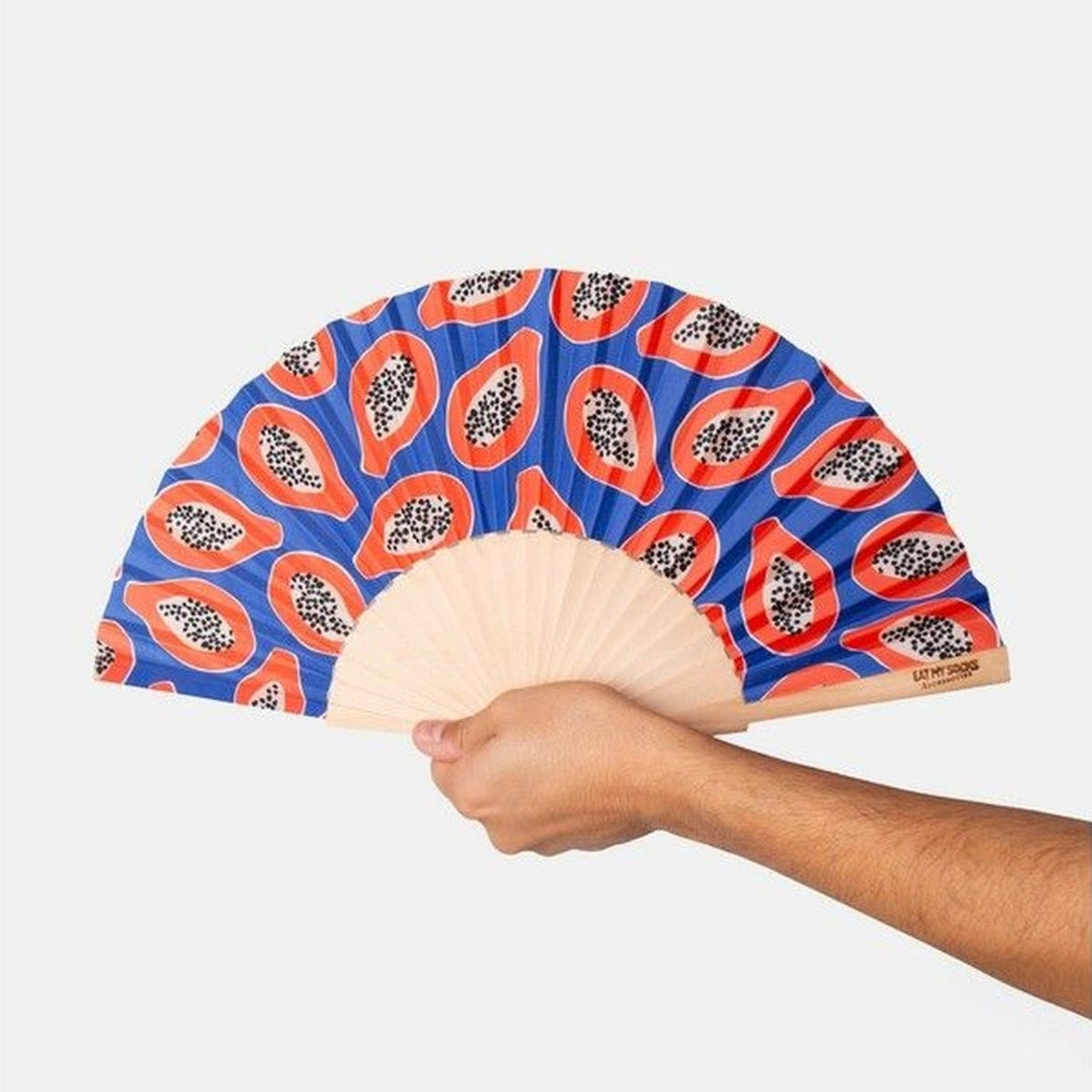 Éventail Papaye ouvert, motif tropical vibrant en détail
