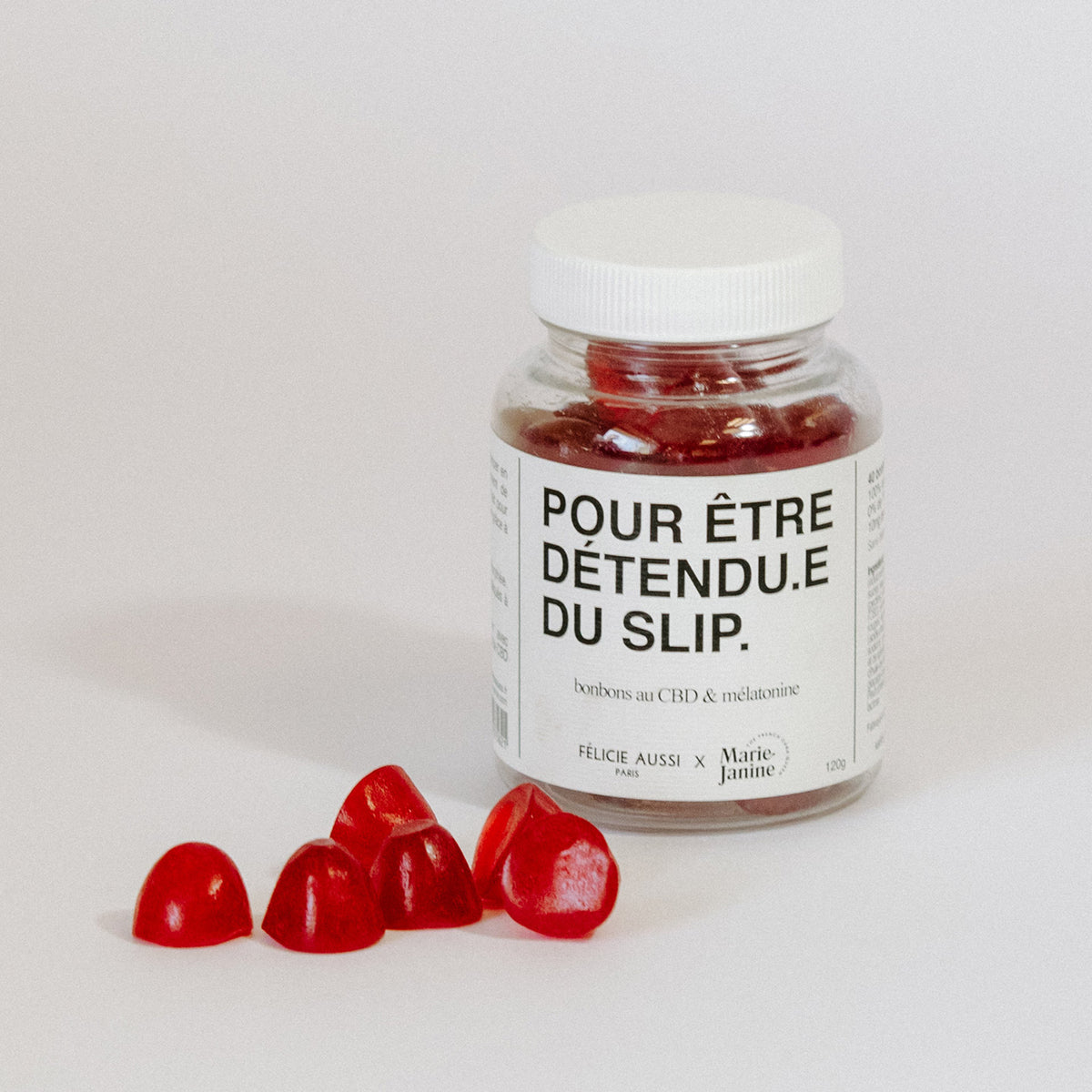 Gummies relaxants aux fruits rouges, texture gélifiée brillante.