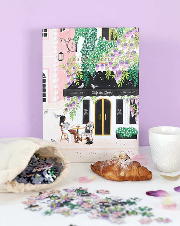 Puzzle représentant un café parisien avec des détails colorés