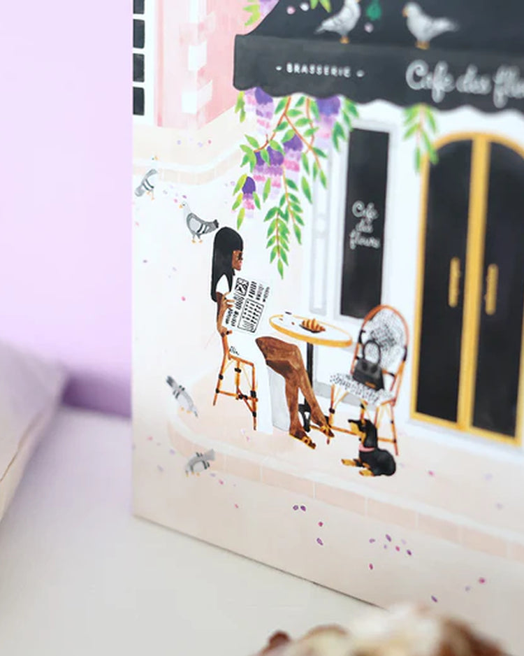 Puzzle représentant un café parisien avec des détails colorés