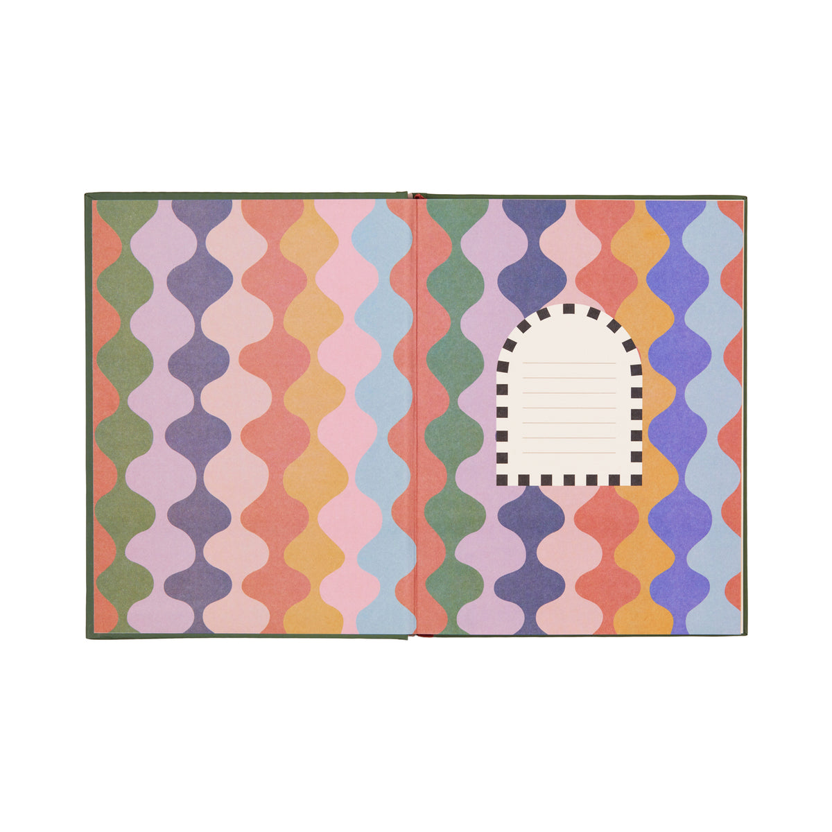 Carnet avec motif soleil sur fond rose vif, ouvert sur une table