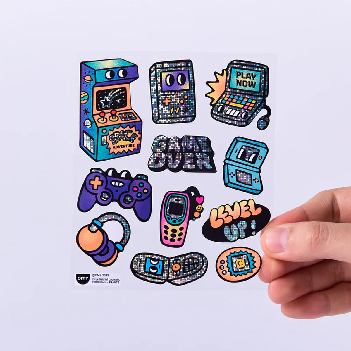Planche de stickers fluo sur fond blanc, motifs jeux vidéo variés