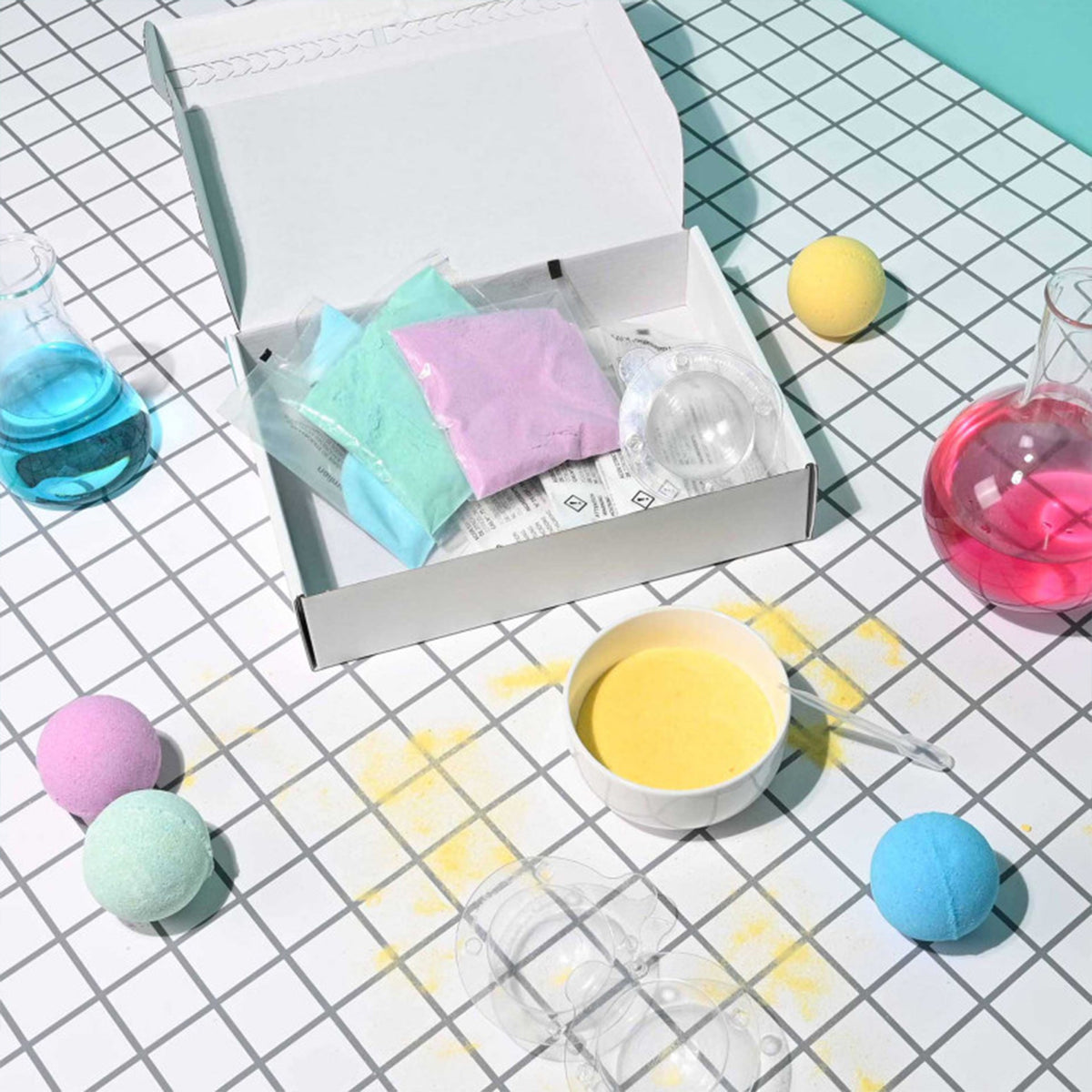 Kit DIY pour créer des boules de bain colorées et effervescentes.